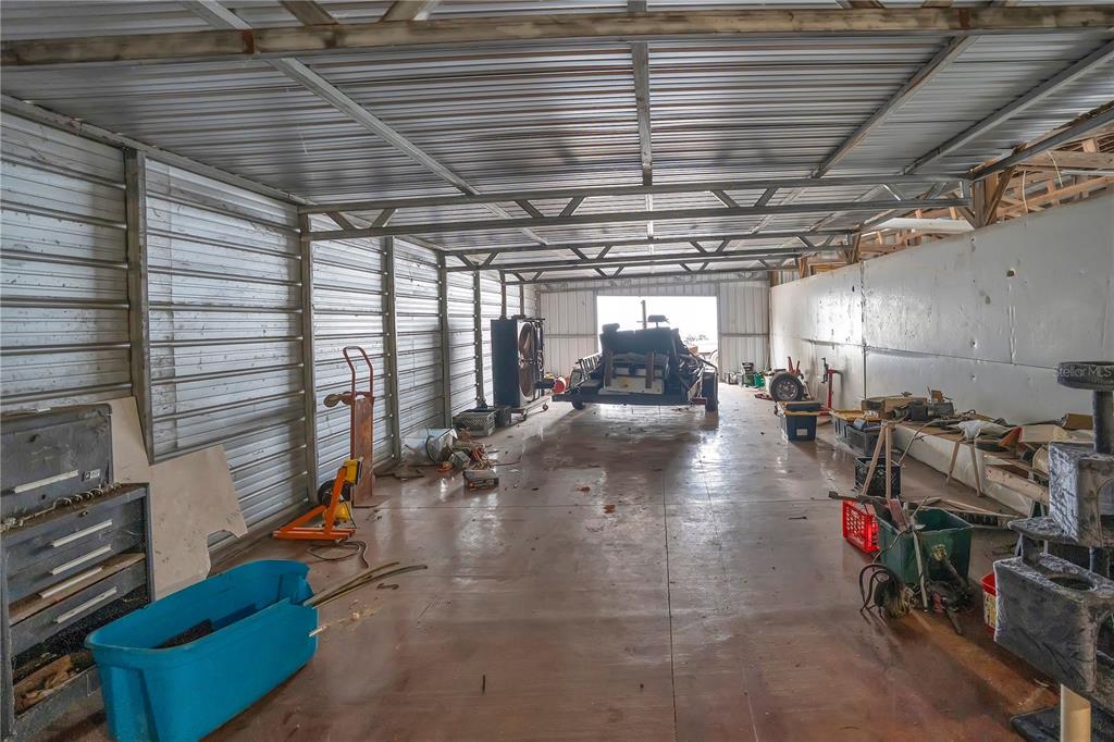 2067 Lake Juanita Road Seville, FL 32190 - Photo 59 of 96 a view of a room with gym equipment