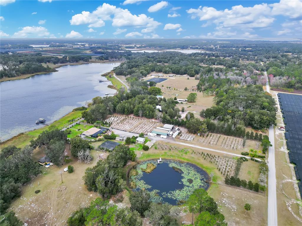 2067 Lake Juanita Road Seville, FL 32190 - Photo 80 of 96 an aerial view of residential houses with outdoor space