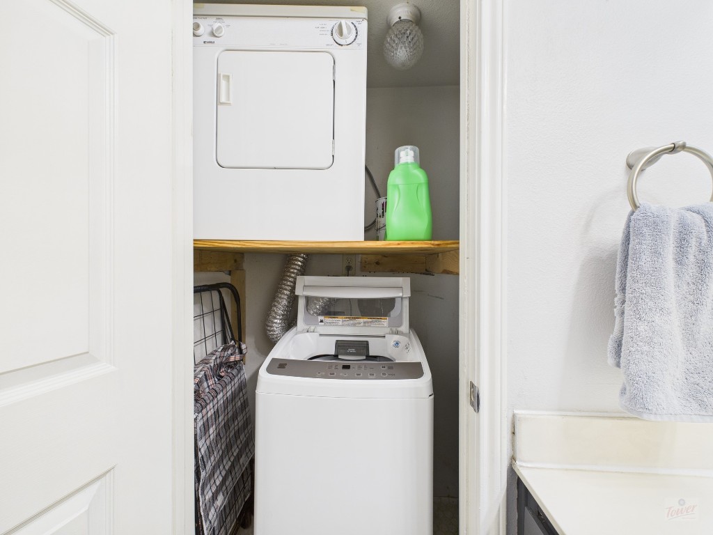 2529 Rio Grande Street, Unit 101 Austin, TX 78705 - Photo 14 of 18 a utility room with dryer and washer
