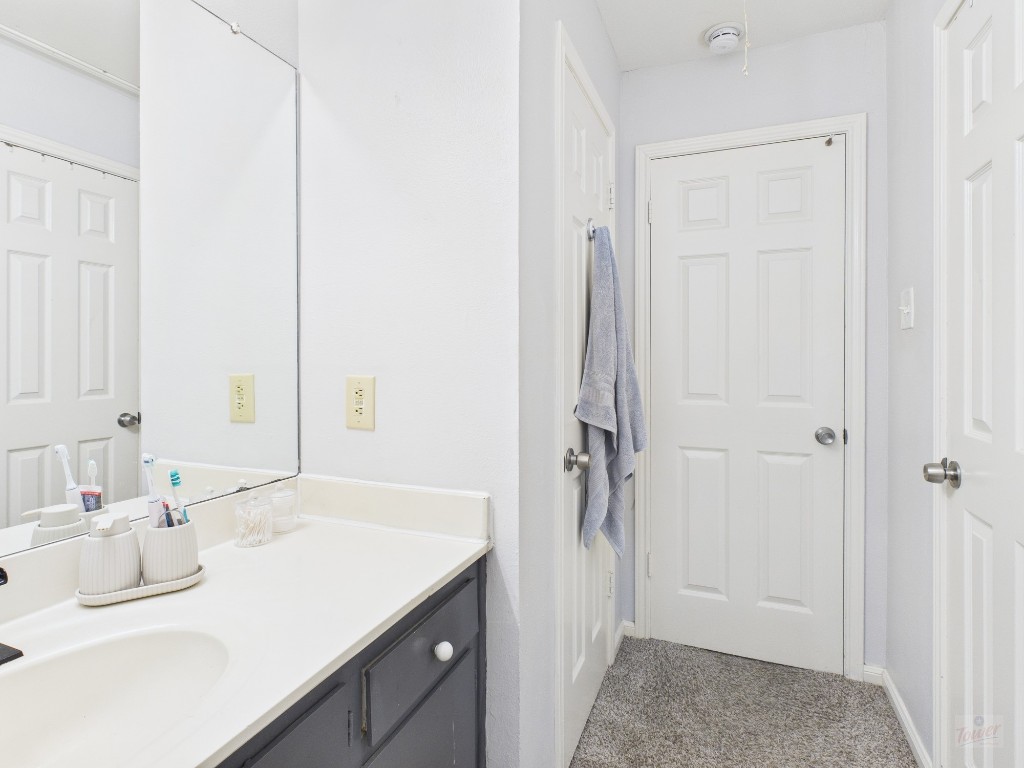 2529 Rio Grande Street, Unit 101 Austin, TX 78705 - Photo 18 of 18 a bathroom with a sink and a mirror
