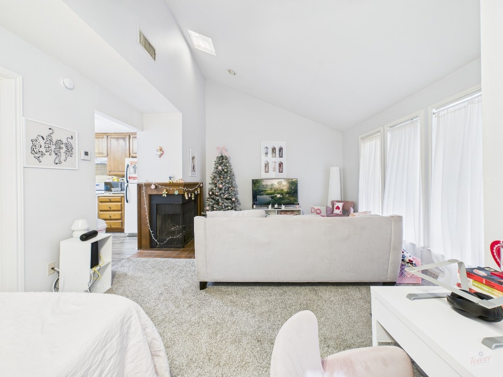 2529 Rio Grande Street, Unit 101 Austin, TX 78705 - Photo 3 of 18 a living room with furniture and a table