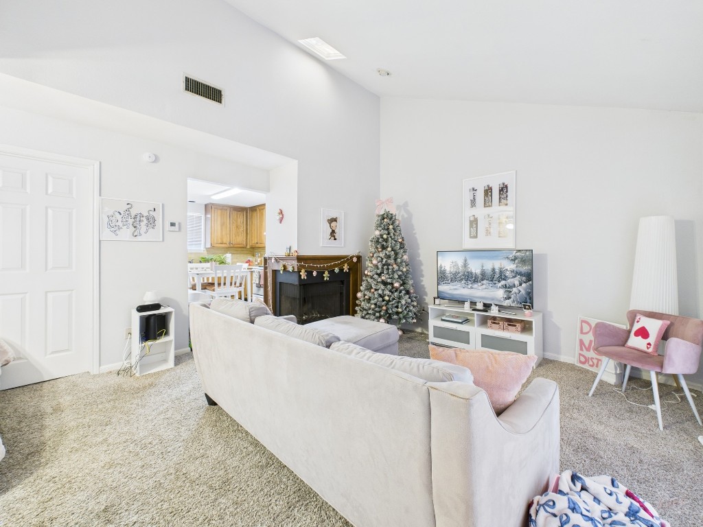 2529 Rio Grande Street, Unit 101 Austin, TX 78705 - Photo 6 of 18 a living room with furniture and a wooden floor