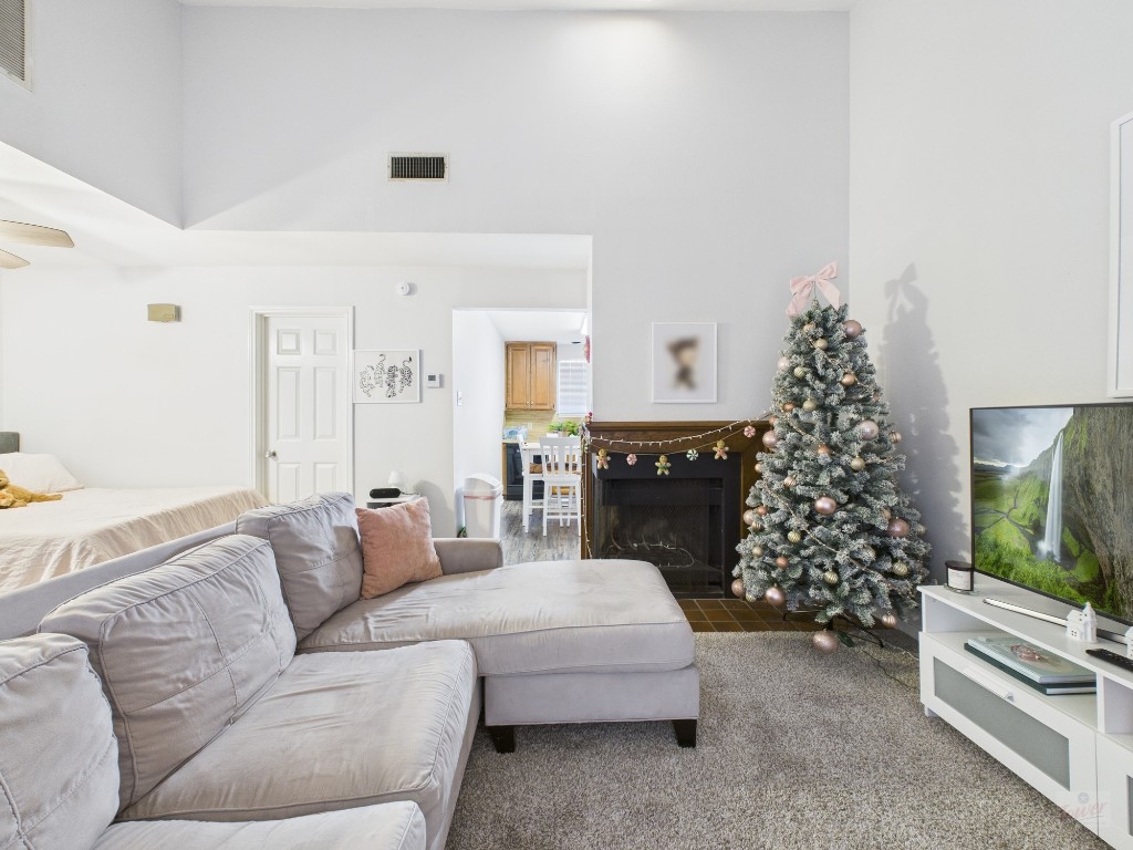 2529 Rio Grande Street, Unit 101 Austin, TX 78705 - Photo 10 of 18 a living room with furniture and a fireplace