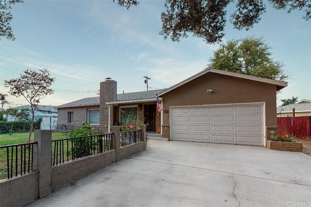 9659 Bolton Avenue Riverside, CA 92503 - Photo 1 of 1 a front view of house with garage