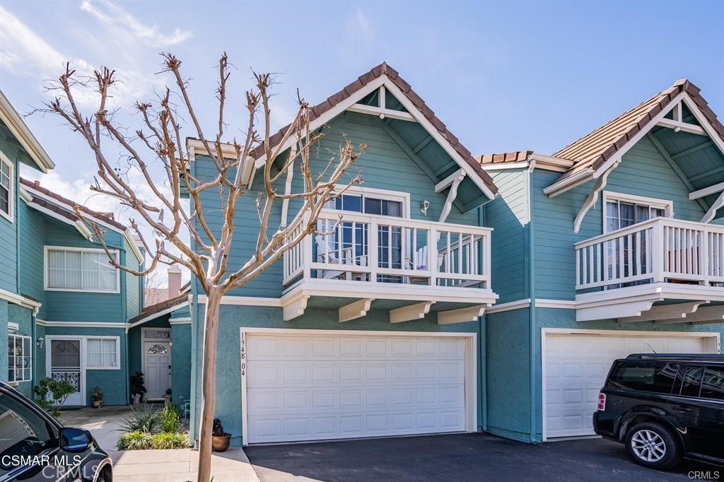 a car parked in front of a house