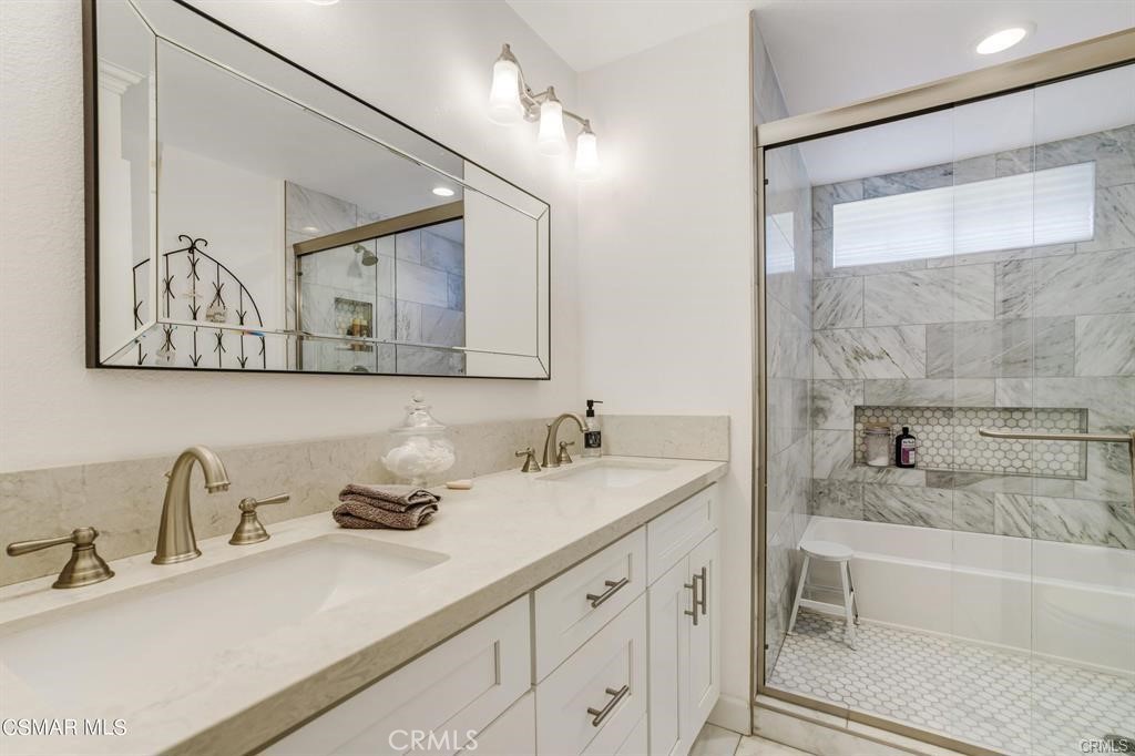 1948 Rory Lane, Unit 4 Simi Valley, CA 93063 - Photo 16 of 23 a bathroom with a sink and a mirror