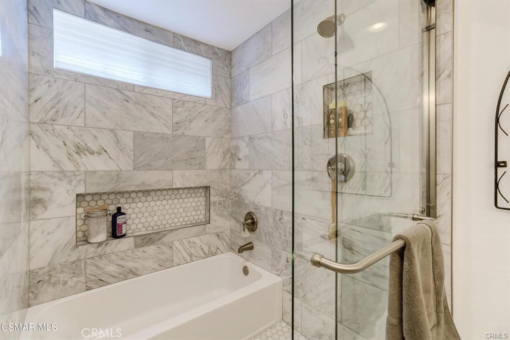 1948 Rory Lane, Unit 4 Simi Valley, CA 93063 - Photo 17 of 23 a bathroom with a bathtub and shower