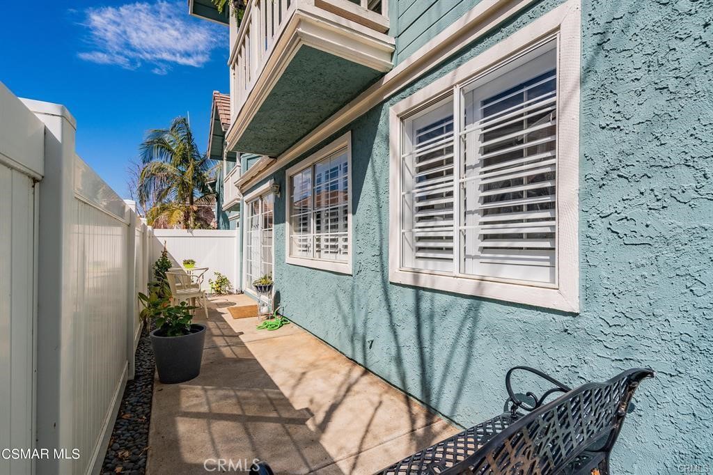 1948 Rory Lane, Unit 4 Simi Valley, CA 93063 - Photo 23 of 23 a balcony with furniture and potted plants