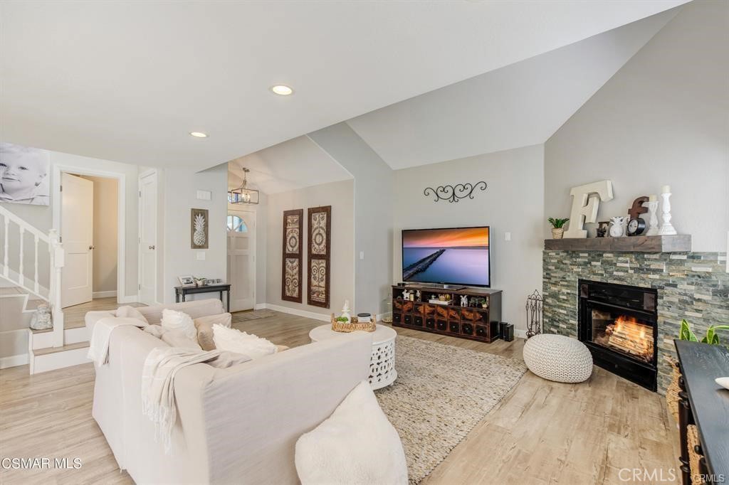 1948 Rory Lane, Unit 4 Simi Valley, CA 93063 - Photo 4 of 23 a living room with furniture and a fireplace