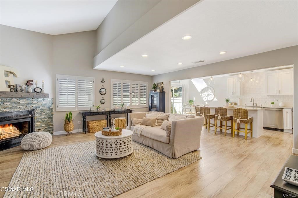 1948 Rory Lane, Unit 4 Simi Valley, CA 93063 - Photo 6 of 23 a living room with furniture and a fireplace