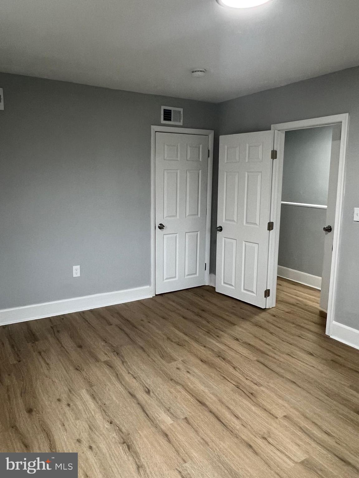 8511 Chestnut Oak Road Parkville, MD 21234 - Photo 14 of 17 a view of a livingroom with wooden floor