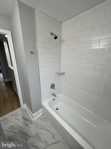 a bathroom with a bathtub