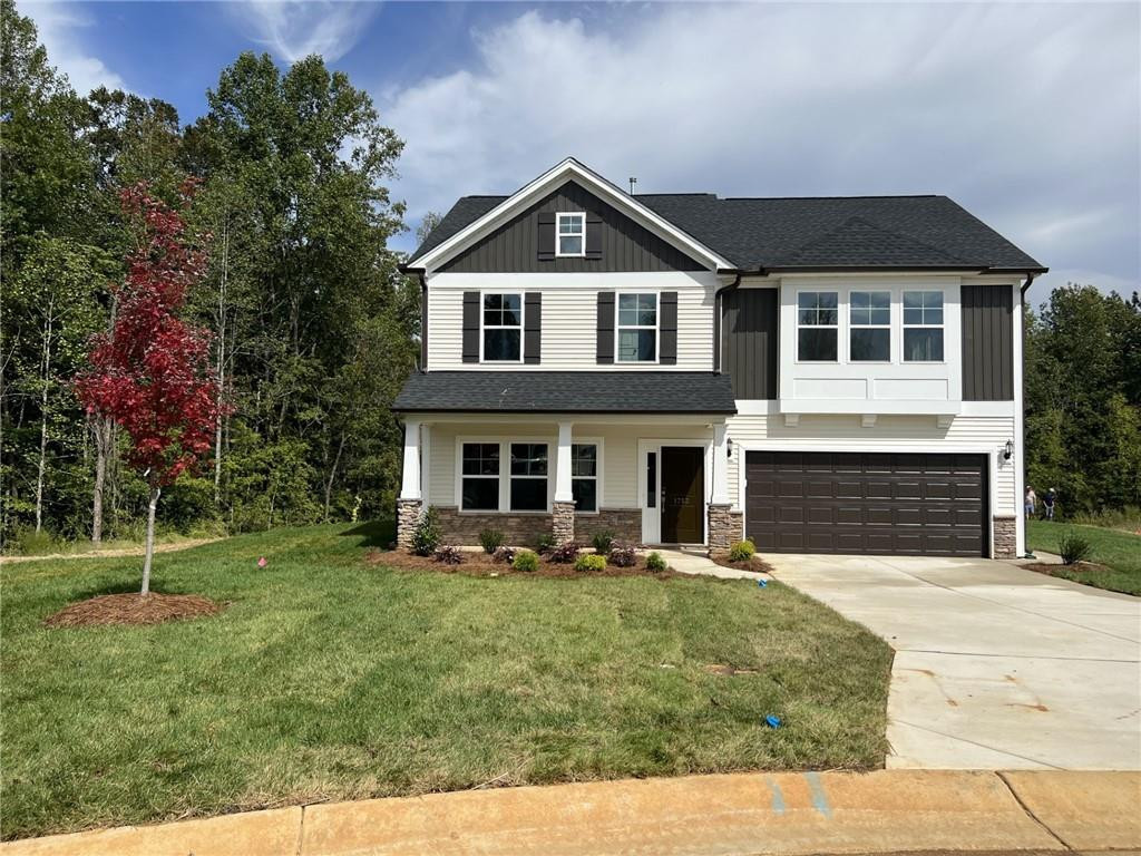 1753 Geyser Court Graham, NC 27253 - Photo 1 of 1 a front view of a house with a yard