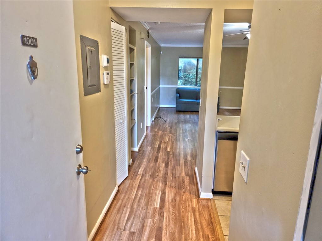 150 Ligon Street, Unit 1001 Clemson, SC 29631 - Photo 3 of 29 Step inside this inviting entry with warm wood flooring and convenient built-in shelving.