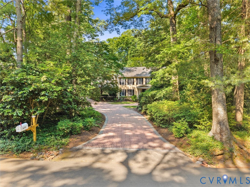 4428 Shirley Road Richmond, VA 23225 - Photo 5 of 70 Lush landscape creates a private enclave.
