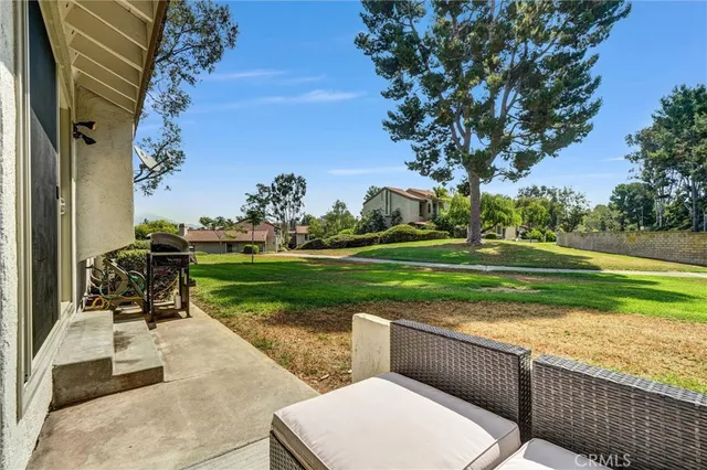 a view of a park with swings and slides