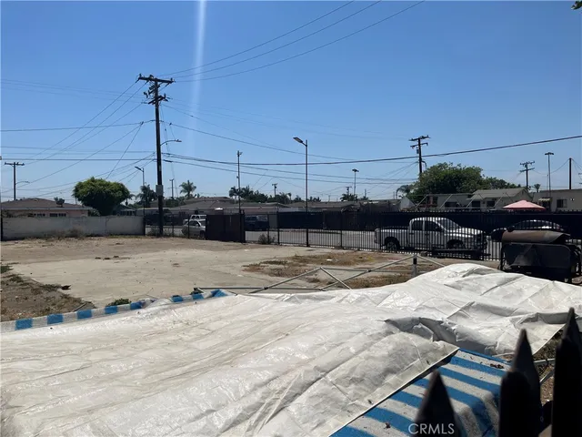 a view of a terrace with wooden fence