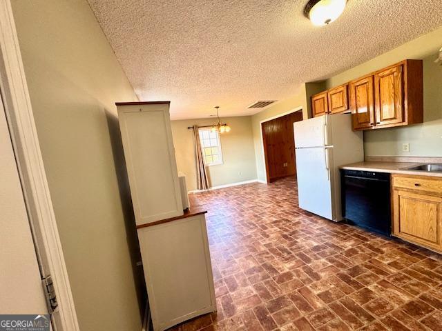 983 Johnny Brannen Road Statesboro, GA 30458 - Photo 12 of 27 a kitchen with stainless steel appliances a refrigerator and a stove