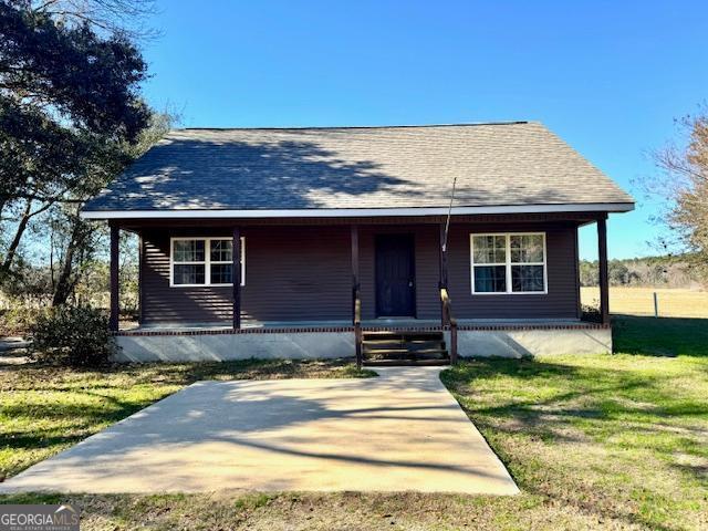 983 Johnny Brannen Road Statesboro, GA 30458 - Photo 2 of 27 a view of a house with a swimming pool