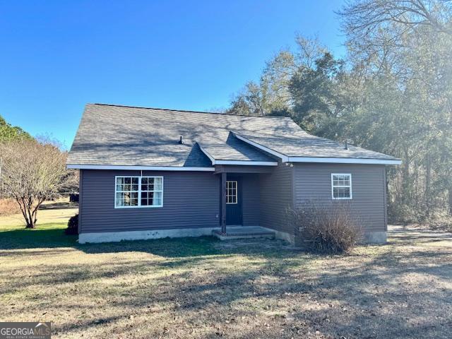983 Johnny Brannen Road Statesboro, GA 30458 - Photo 23 of 27 a backyard of a house with lots of green space