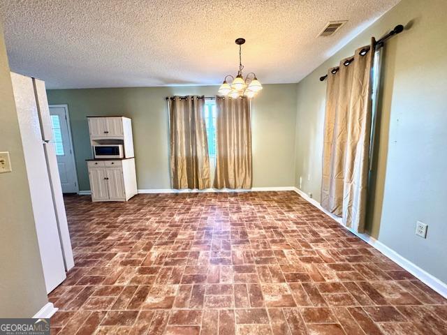 983 Johnny Brannen Road Statesboro, GA 30458 - Photo 9 of 27 a view of a kitchen with a stove