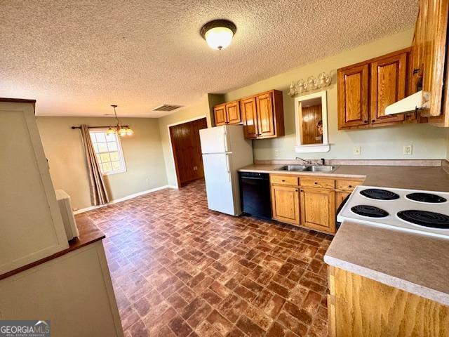983 Johnny Brannen Road Statesboro, GA 30458 - Photo 10 of 27 a kitchen with stainless steel appliances granite countertop a sink and cabinets