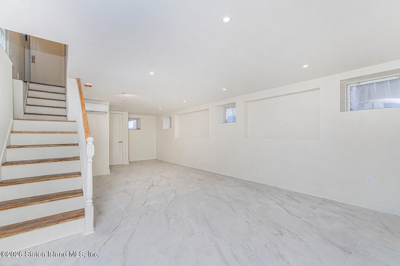 332 Willowbrook Road Staten Island, NY 10314 - Photo 15 of 17 a view of a room with white walls