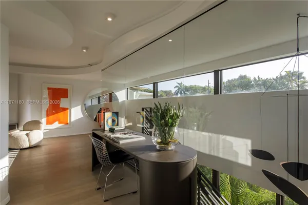 a view of a dining room with furniture window and outside view