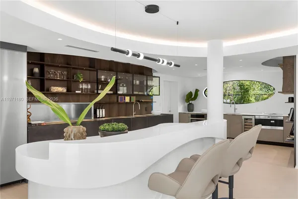 a living room with furniture and white floor
