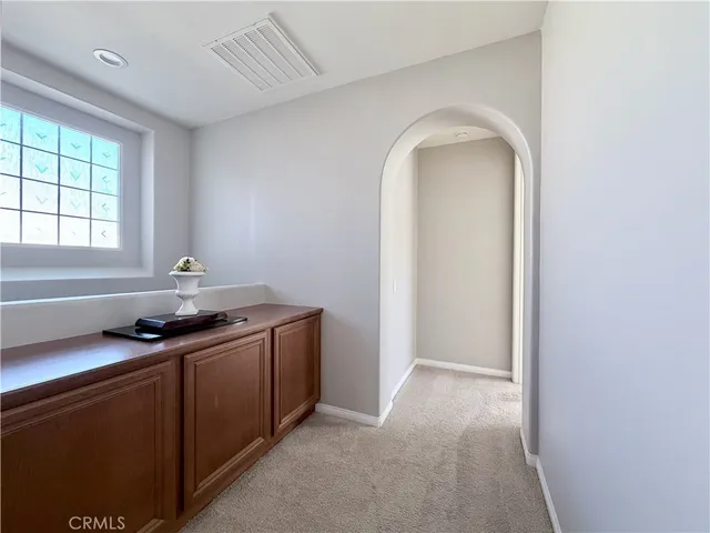 a room with furniture and natural light