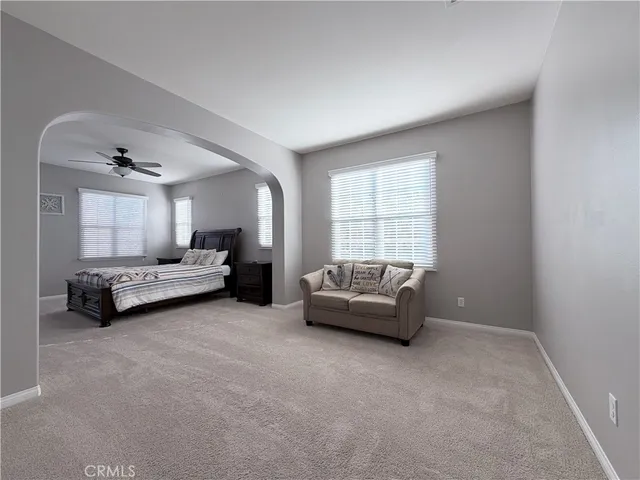 a view of empty room with windows