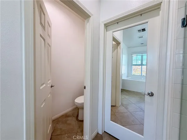 a view of a wooden floor with a fire pit