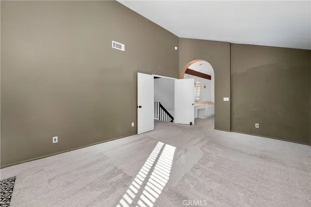 a view of empty room with windows