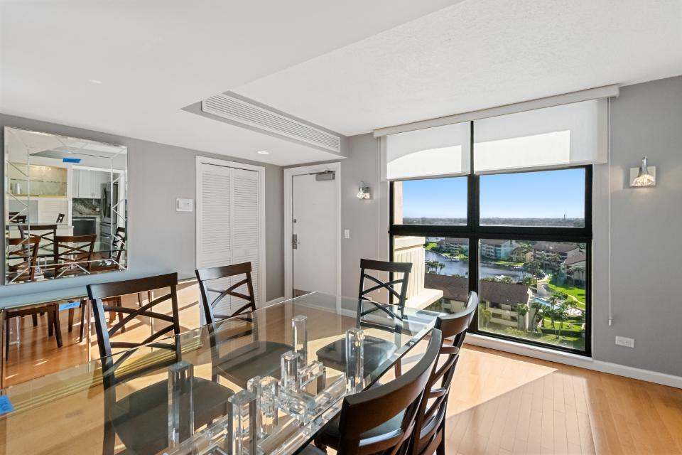 136 Lakeshore Drive, Unit PH10 North Palm Beach, FL 33408 - Photo 15 of 38 a view of a dining room with furniture window and outside view