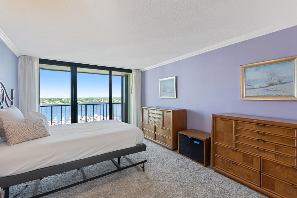 136 Lakeshore Drive, Unit PH10 North Palm Beach, FL 33408 - Photo 16 of 38 a bedroom with a bed and a window