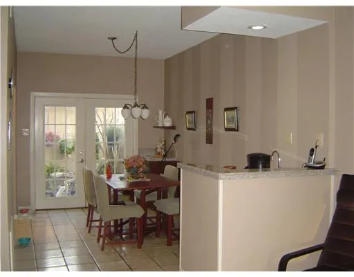 a workspace with furniture and window