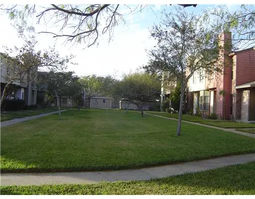 a kitchen with a stove and a microwave