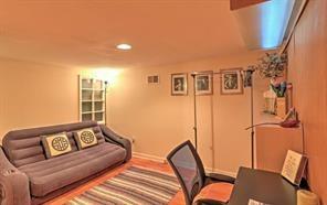 843 Artwood Road Northeast, Unit 843 Atlanta, GA 30307 - Photo 13 of 18 a living room with furniture