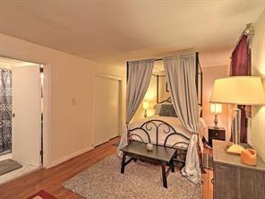 843 Artwood Road Northeast, Unit 843 Atlanta, GA 30307 - Photo 8 of 18 a view of a room with furniture and wooden floor