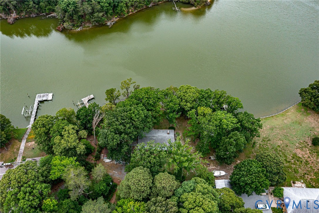 142 Bridge Lane Reedville, VA 22539 - Photo 23 of 56 an aerial view of a house with a yard and lake view