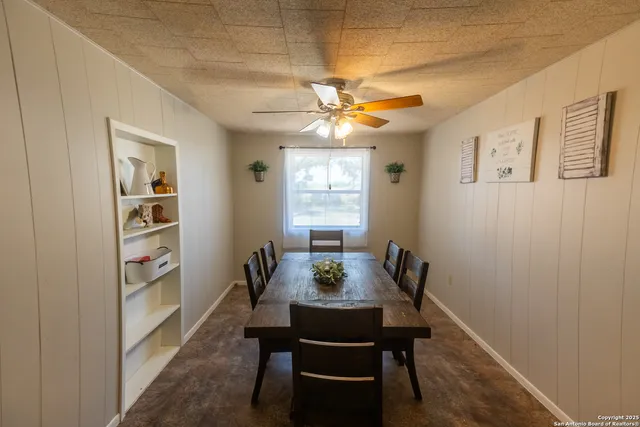 a view of a dining room with furniture