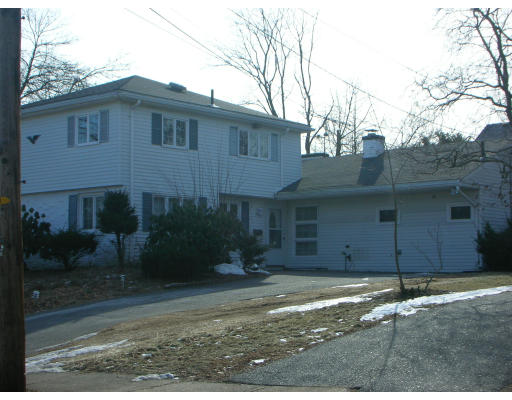 30 Maynard Street Newton, MA 02465 - Photo 1 of 1 a house with trees in front of it