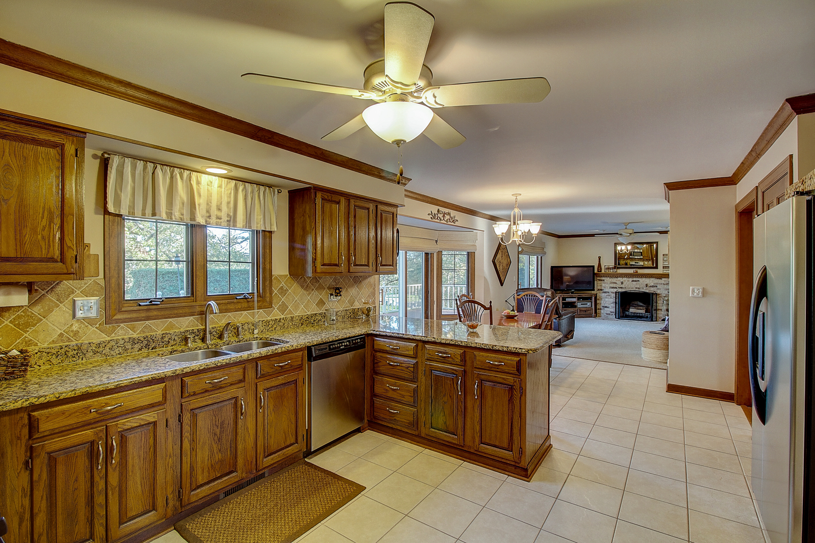 35W522 Miller Road Algonquin, IL 60102 - Photo 12 of 63 a kitchen with stainless steel appliances granite countertop a sink and cabinets
