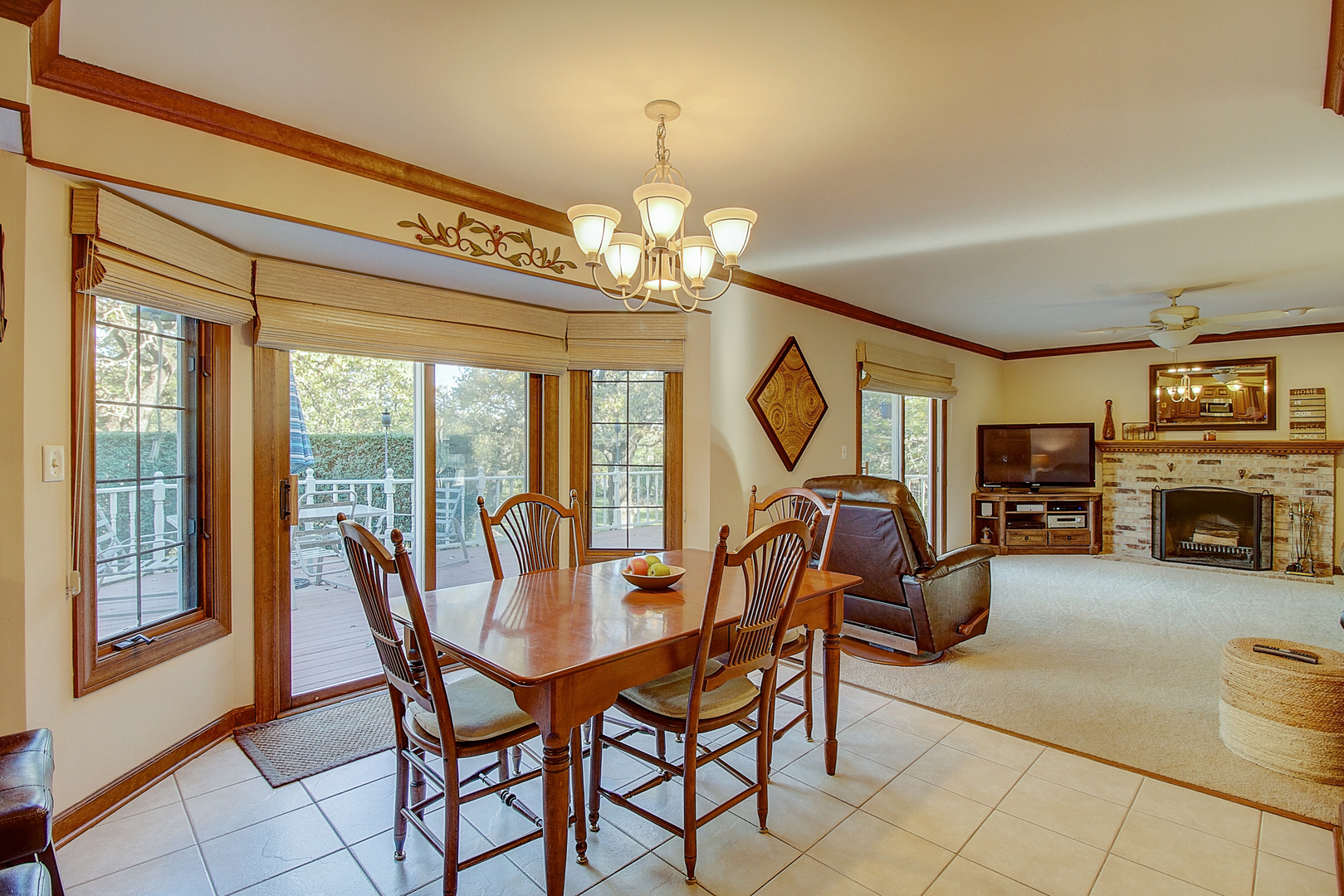 35W522 Miller Road Algonquin, IL 60102 - Photo 14 of 63 a view of a dining room with furniture a chandelier and large windows