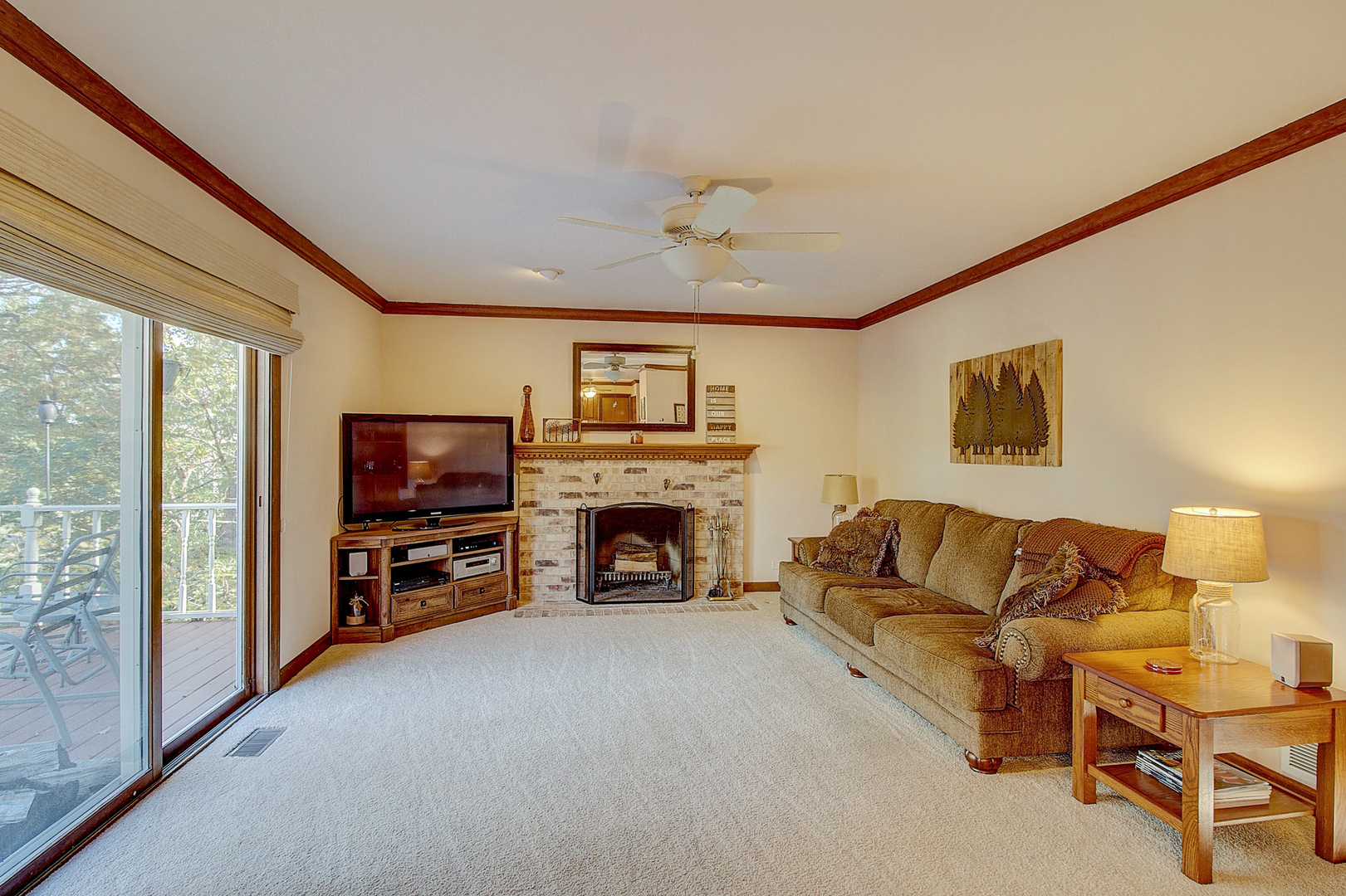 35W522 Miller Road Algonquin, IL 60102 - Photo 18 of 63 a living room with furniture a fireplace and a flat screen tv