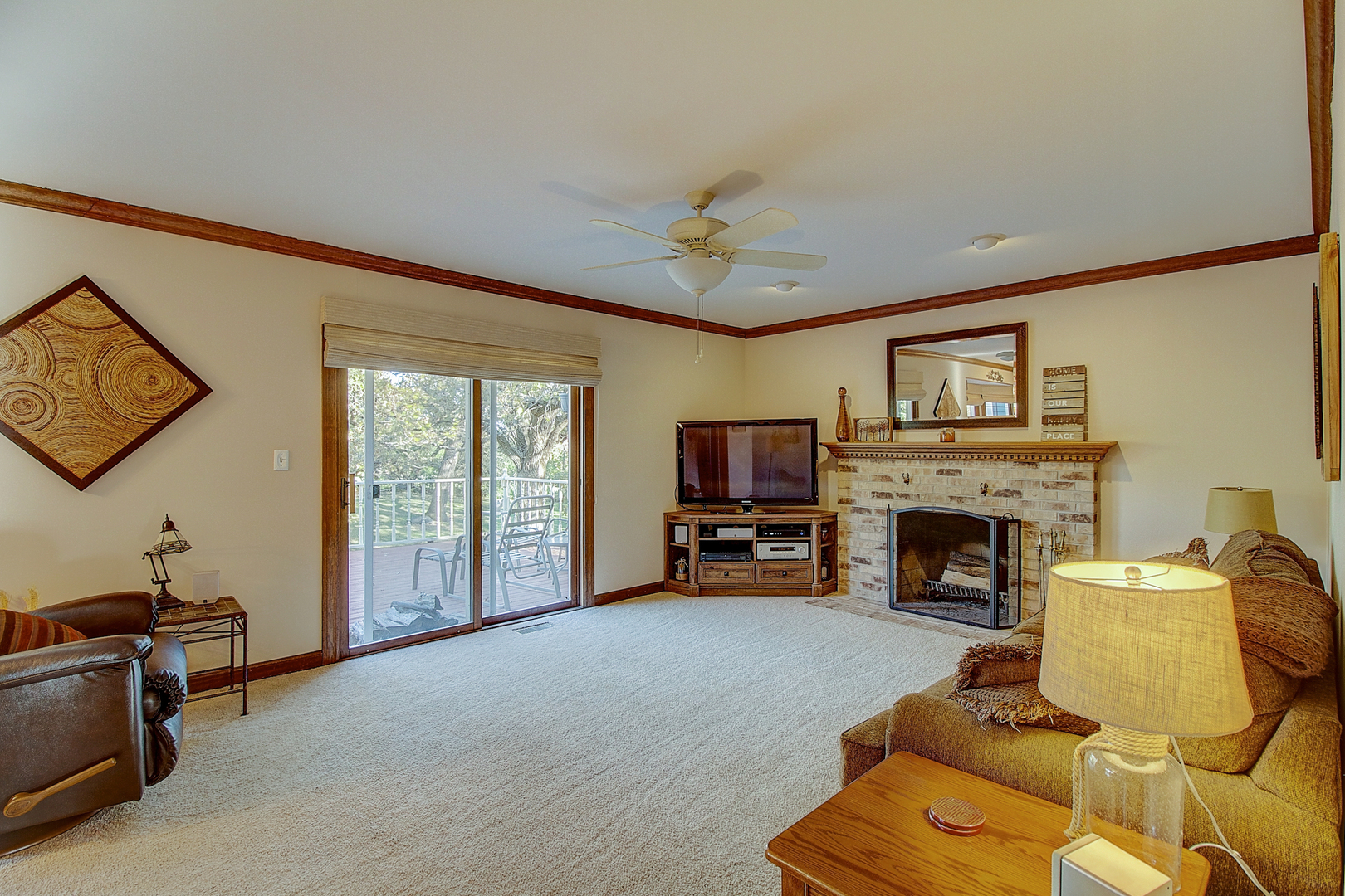35W522 Miller Road Algonquin, IL 60102 - Photo 20 of 63 a living room with furniture flat screen tv and a fireplace