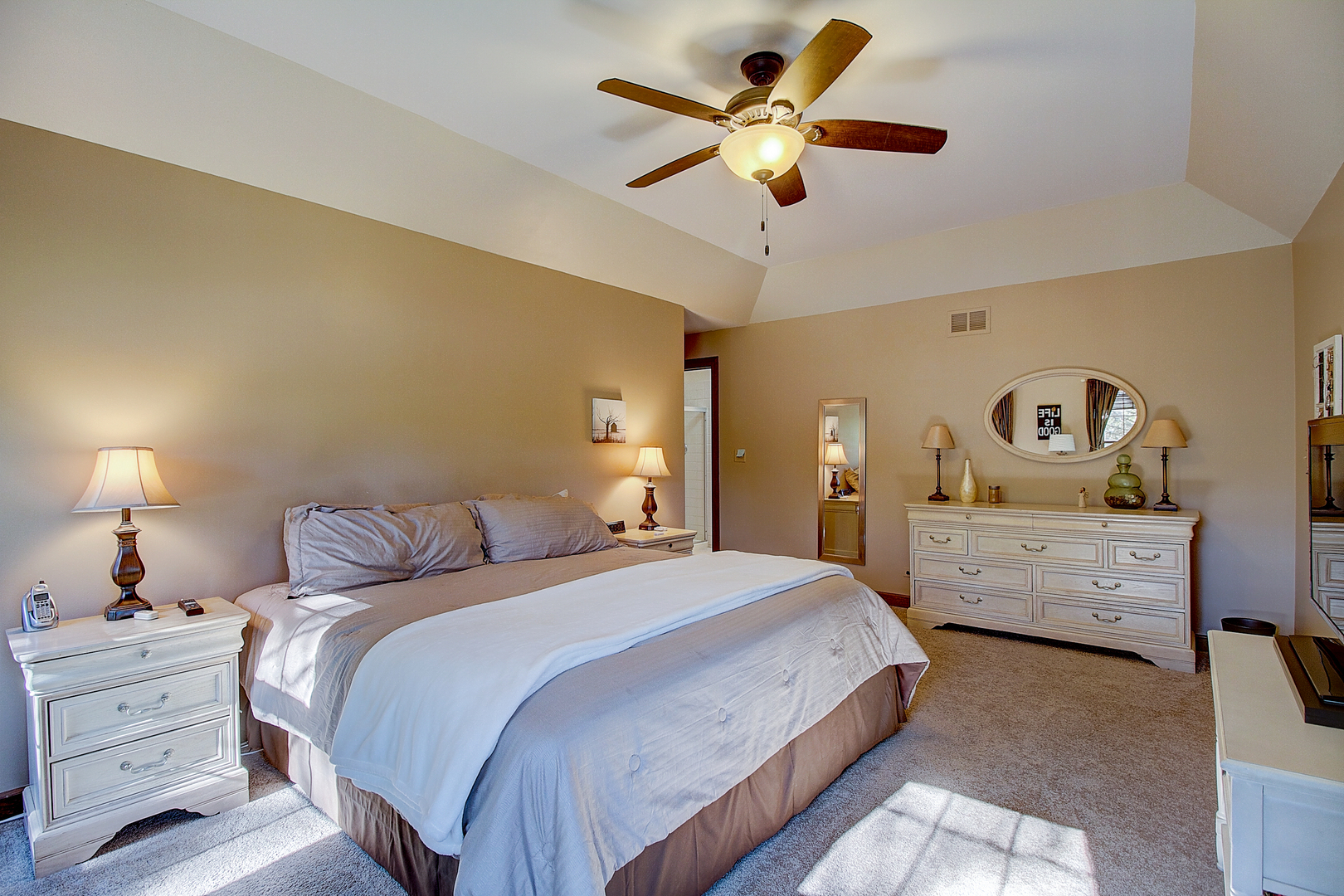 35W522 Miller Road Algonquin, IL 60102 - Photo 22 of 63 a bedroom with a bed and a chandelier