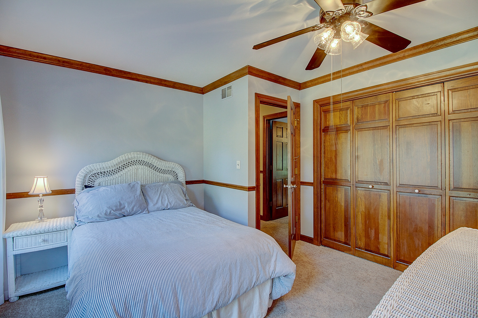 35W522 Miller Road Algonquin, IL 60102 - Photo 29 of 63 a bedroom with a bed and a chandelier
