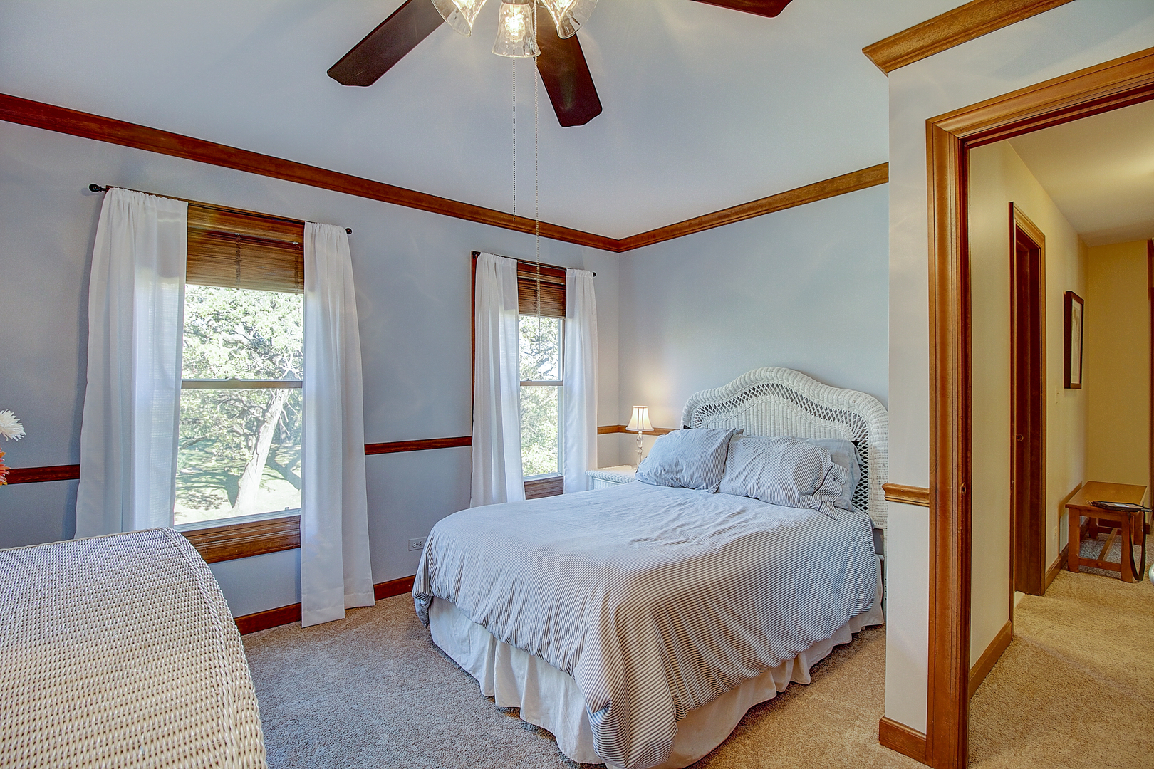 35W522 Miller Road Algonquin, IL 60102 - Photo 30 of 63 a bedroom with a large bed and a chandelier