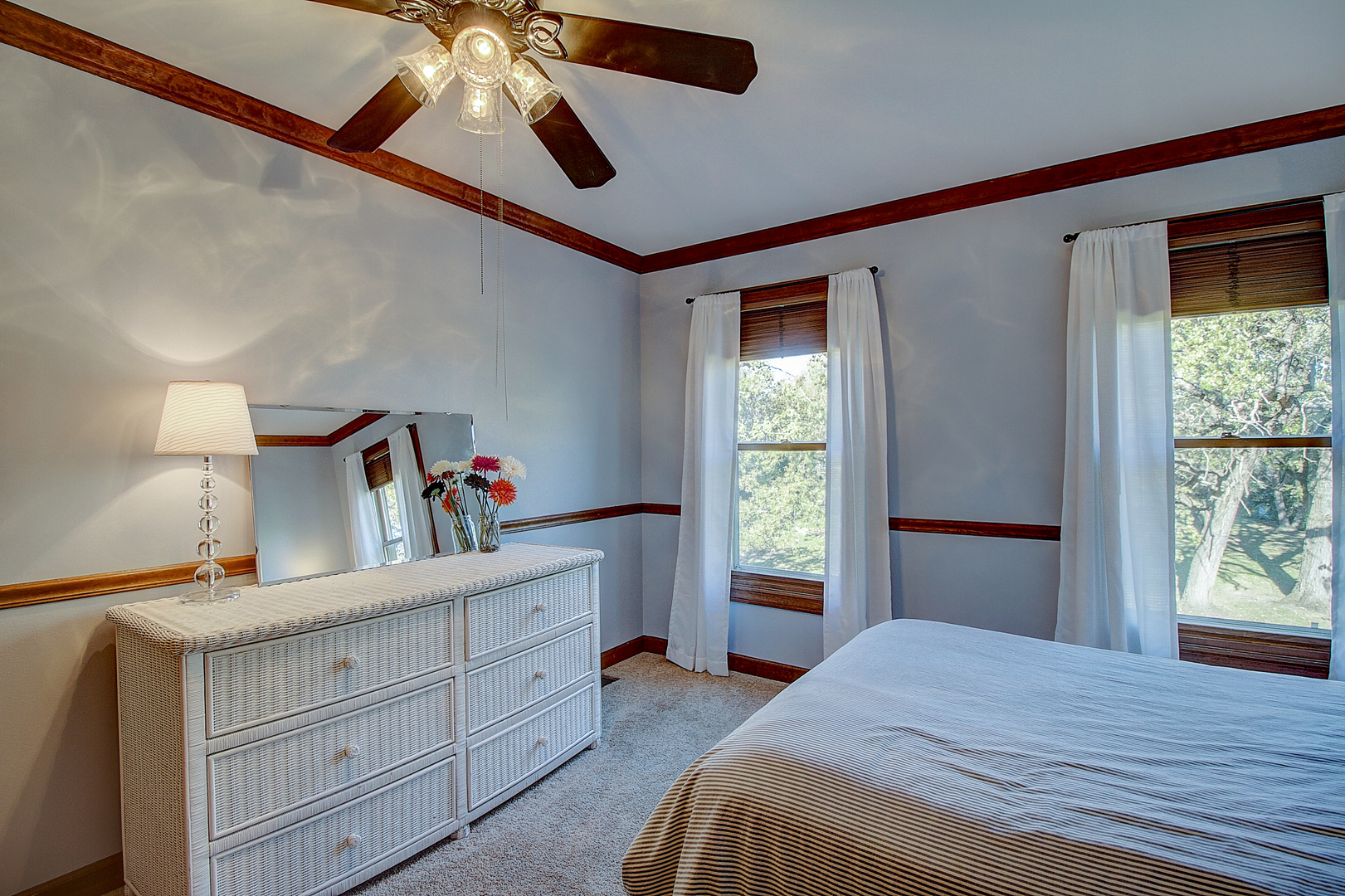 35W522 Miller Road Algonquin, IL 60102 - Photo 31 of 63 a bedroom with a bed and a dresser next to a window